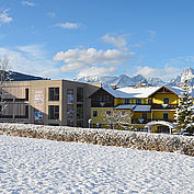 Landhotel Stockerwirt - Hotelansicht im Winter mit neuem Panoramaflügel