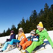 © TVB Abtenau - Winterrodeln ein Spass für die ganze Familie 